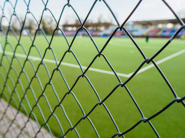 What size mesh is typically used for tennis court fencing?