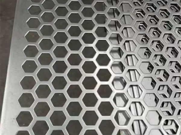 What are the materials and perforation patterns of perforated metal mesh?